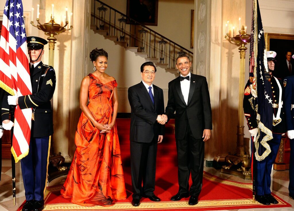 First Lady in red: a bold Alexander McQueen gown for a State Dinner with President Jintao of China in 2011.